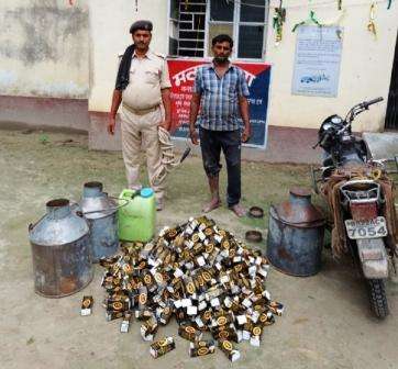 Smuggler arrested for supplying foreign liquor by hiding in milk tank
